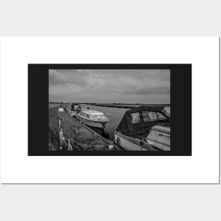 Boats moored on the River Yare in Acle, Norfolk Posters and Art